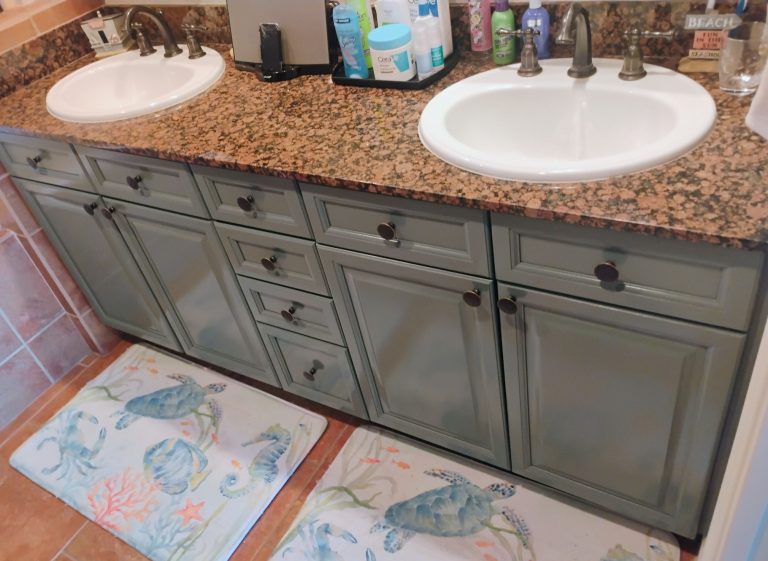 Expertly refinished wood cabinets showcasing smooth finish and natural grain detail.